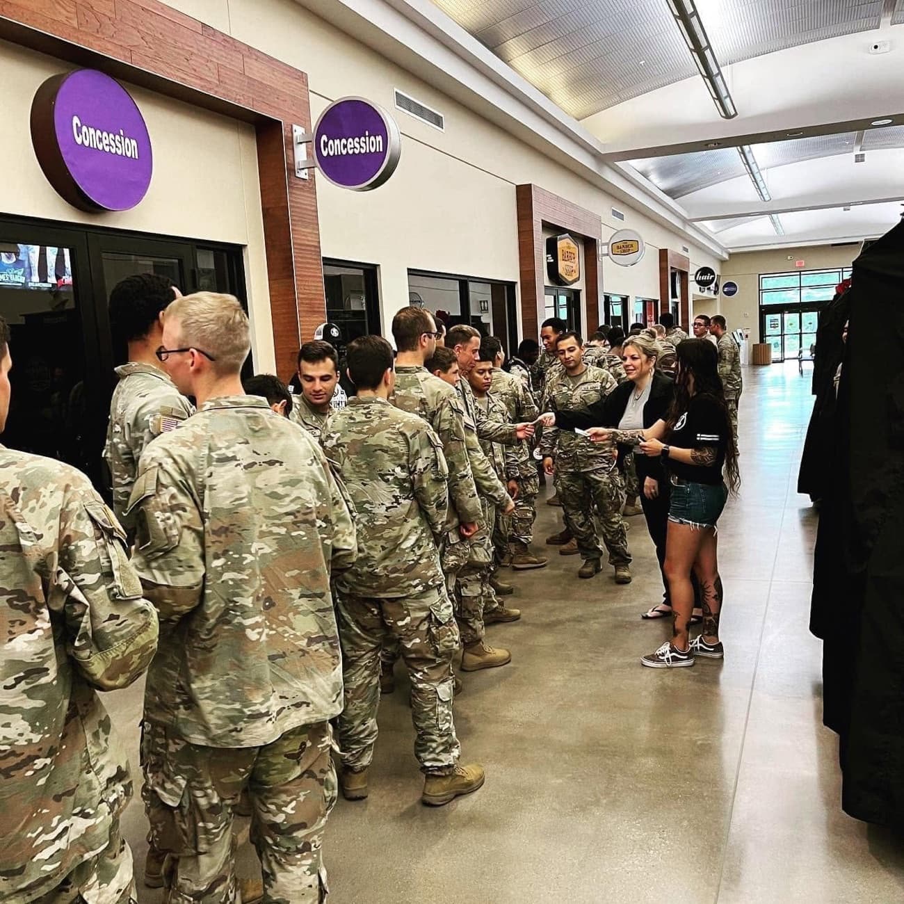 American Tattoo Society staff meeting service members on base